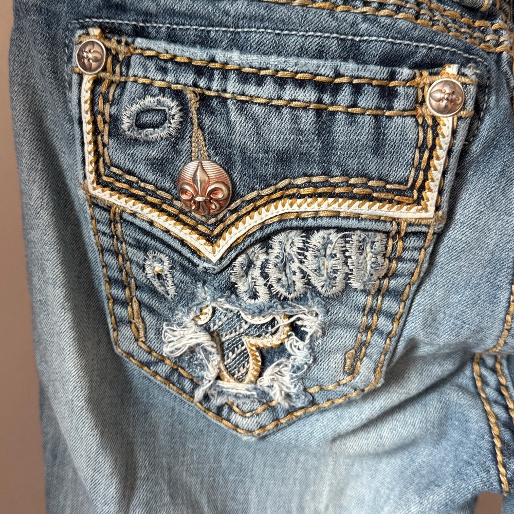 Rock Revival Women’s  Betty Ripped straight leg distressed denim, blue jeans